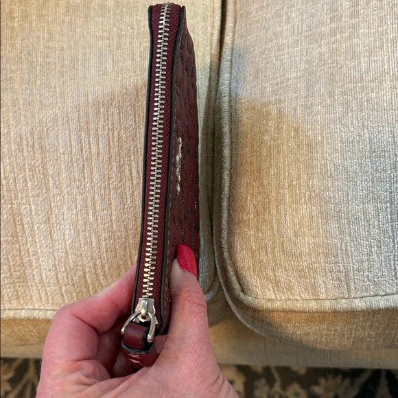 Coach Maroon Poppy Embossed Wristlet - Picture 5 of 7